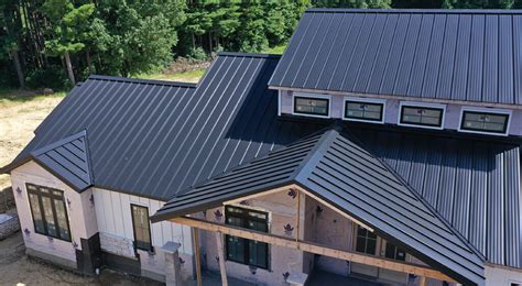 black house with black metal roof|black standing seam metal roofing.